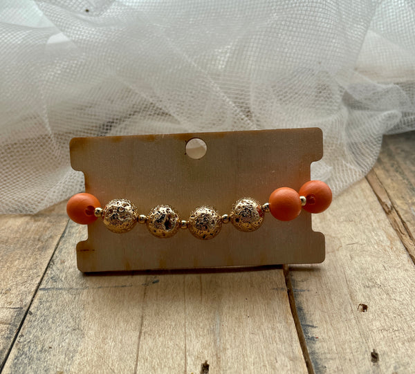 orange metal & wood bead stretch bracelet