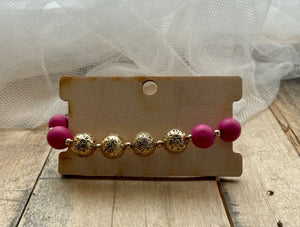 pink metal & wood bead stretch bracelet