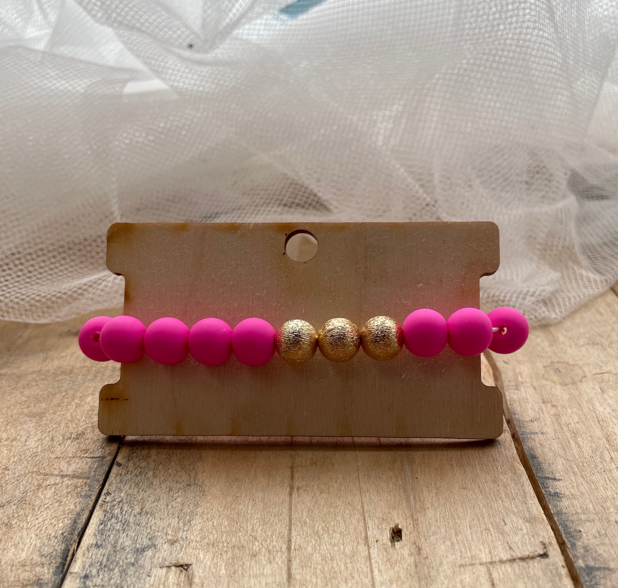 pink and gold bracelet